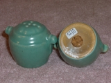 Early barrel shaker glazed jade green.